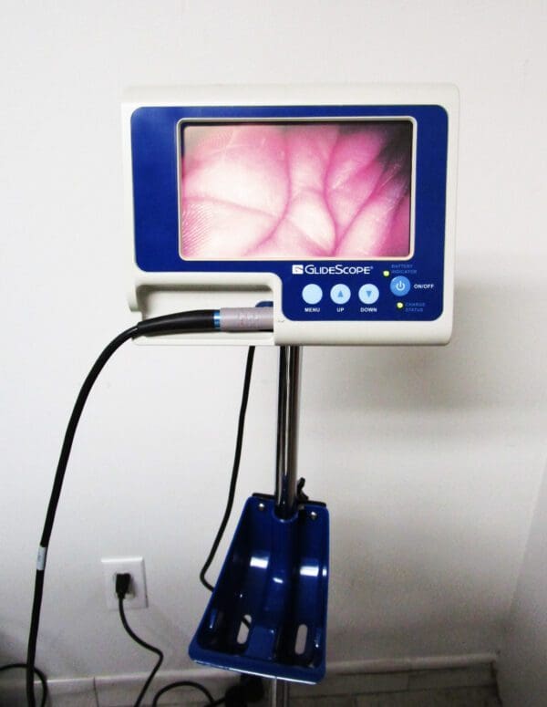 A medical device with a monitor attached to it.