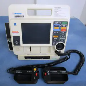 A defibrillator with two batteries and one cord.
