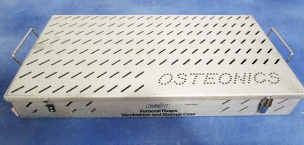 A box of a metal case with a pattern on it.