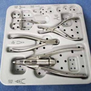 A tray of surgical instruments in plastic case.