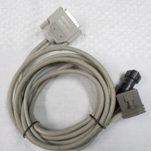 A gray cable with a white plug attached to it.