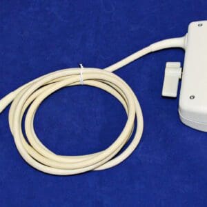 A white device with a cord attached to it.