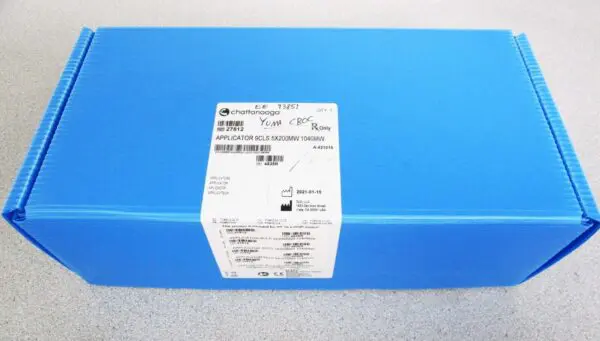 A box of medical supplies on top of a blue table.