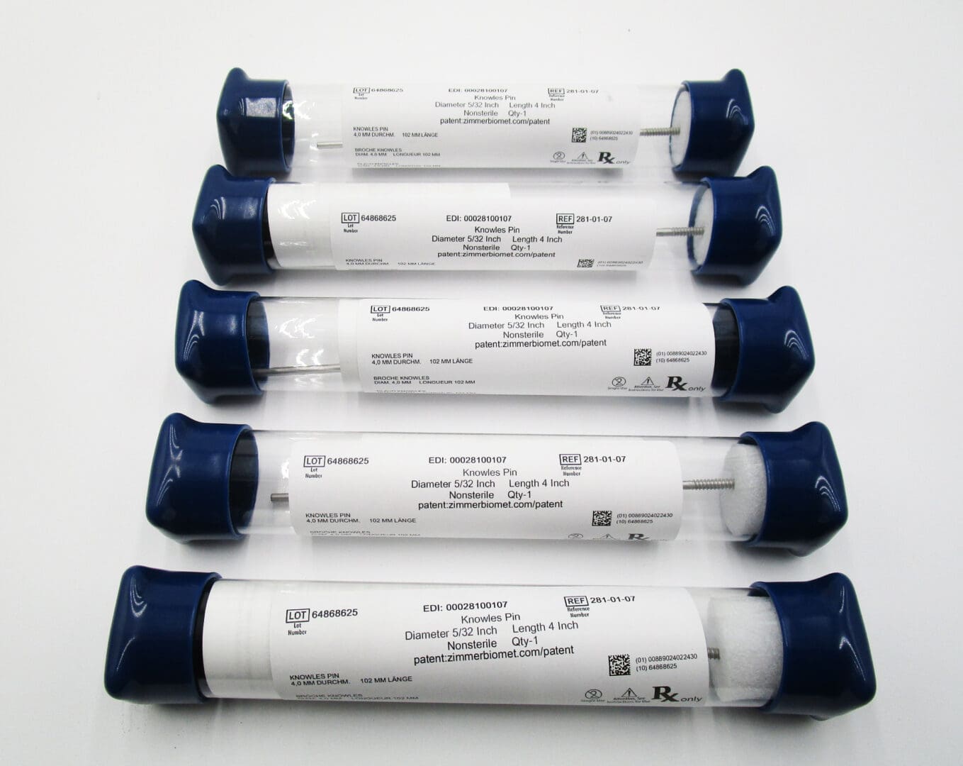 A group of six tubes with blue caps on them.