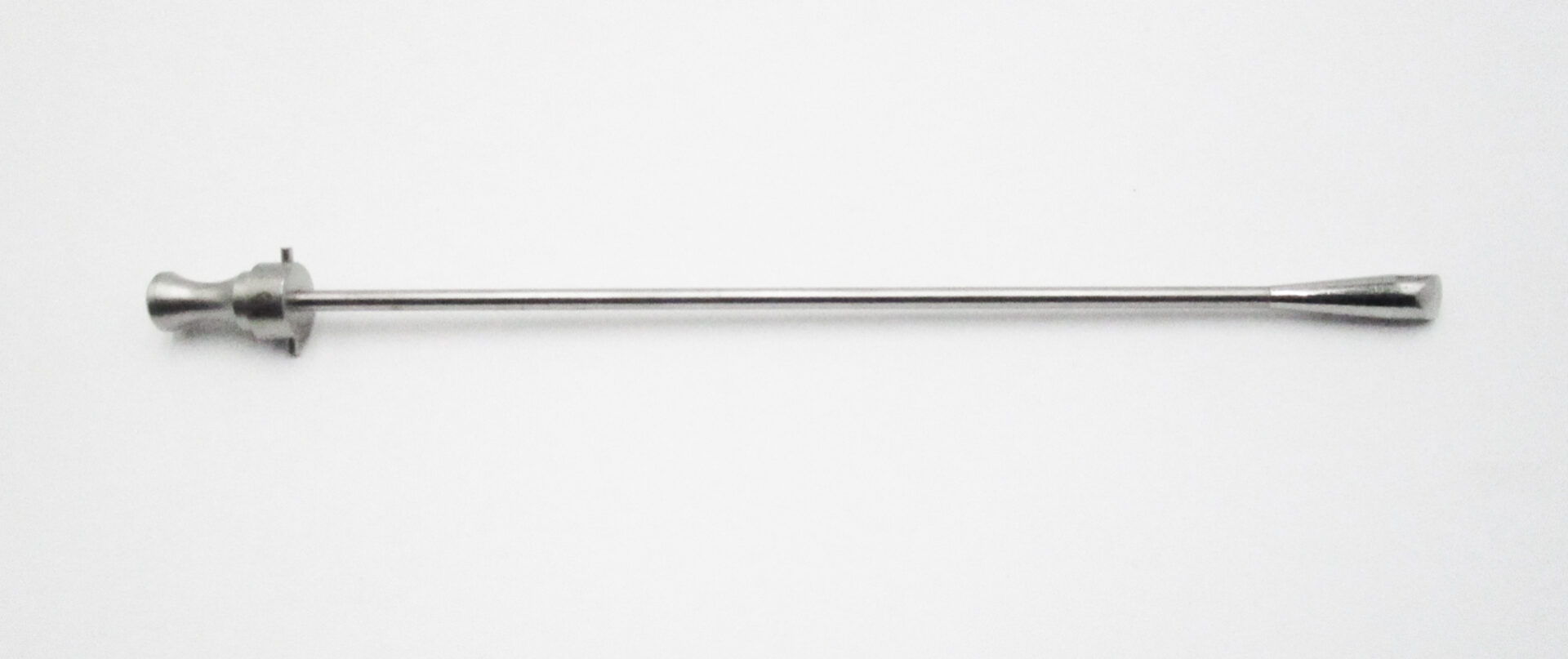 A long metal pole with a white background