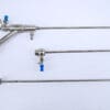 Surgical instruments with blue handles.
