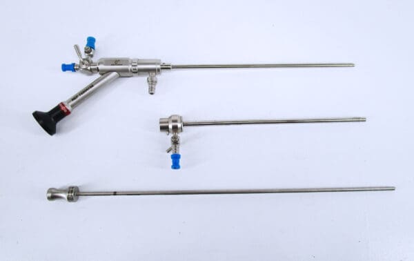 Surgical instruments with blue handles.