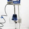 A blue and white scale with wires attached to it