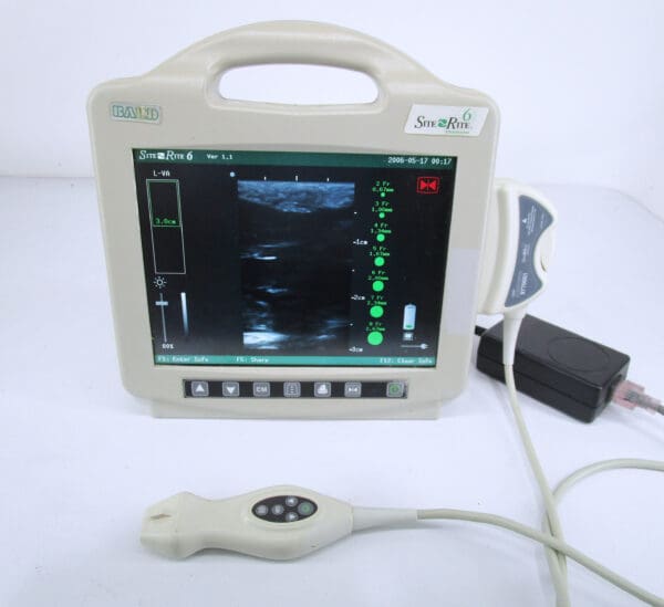 Ultrasound machine with connected probe and display.