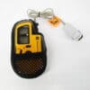 Yellow pulse oximeter with finger probe.
