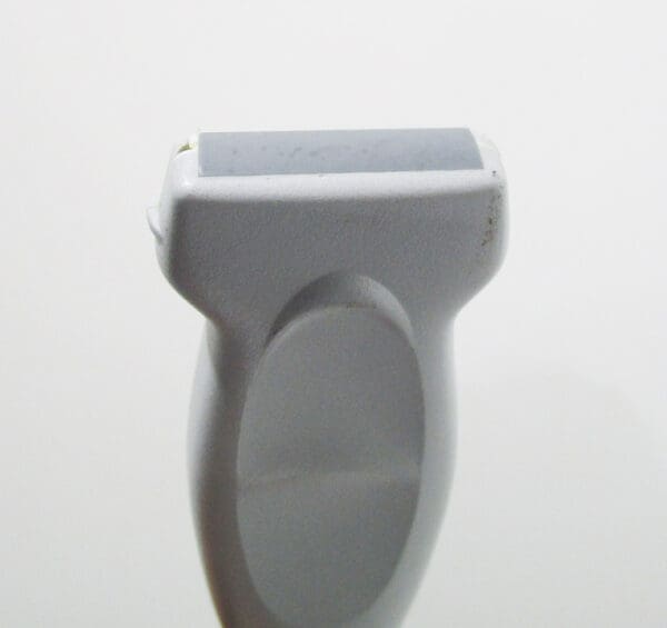 Gray plastic medical device handle.