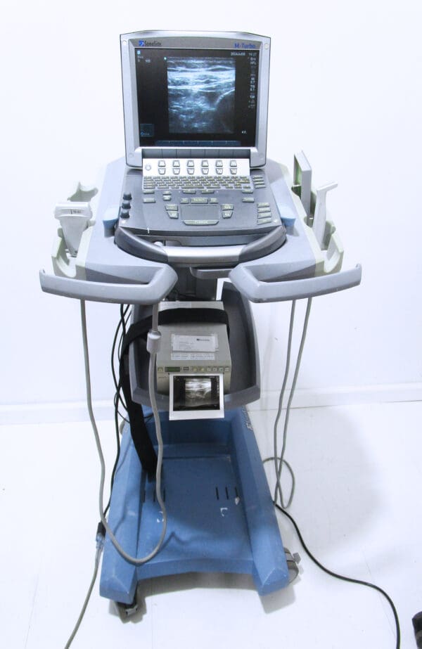 Ultrasound machine on a rolling cart.